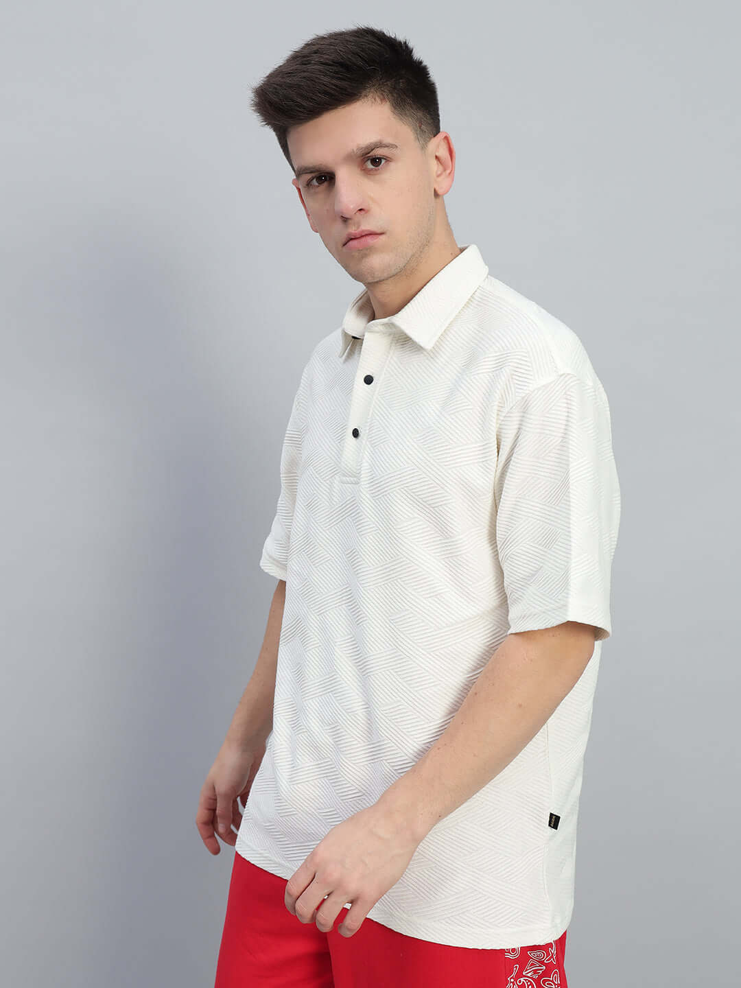 BROCADE POLO COTTON T-SHIRT OFF WHITE on model showcasing textured elegance and comfortable fit.
