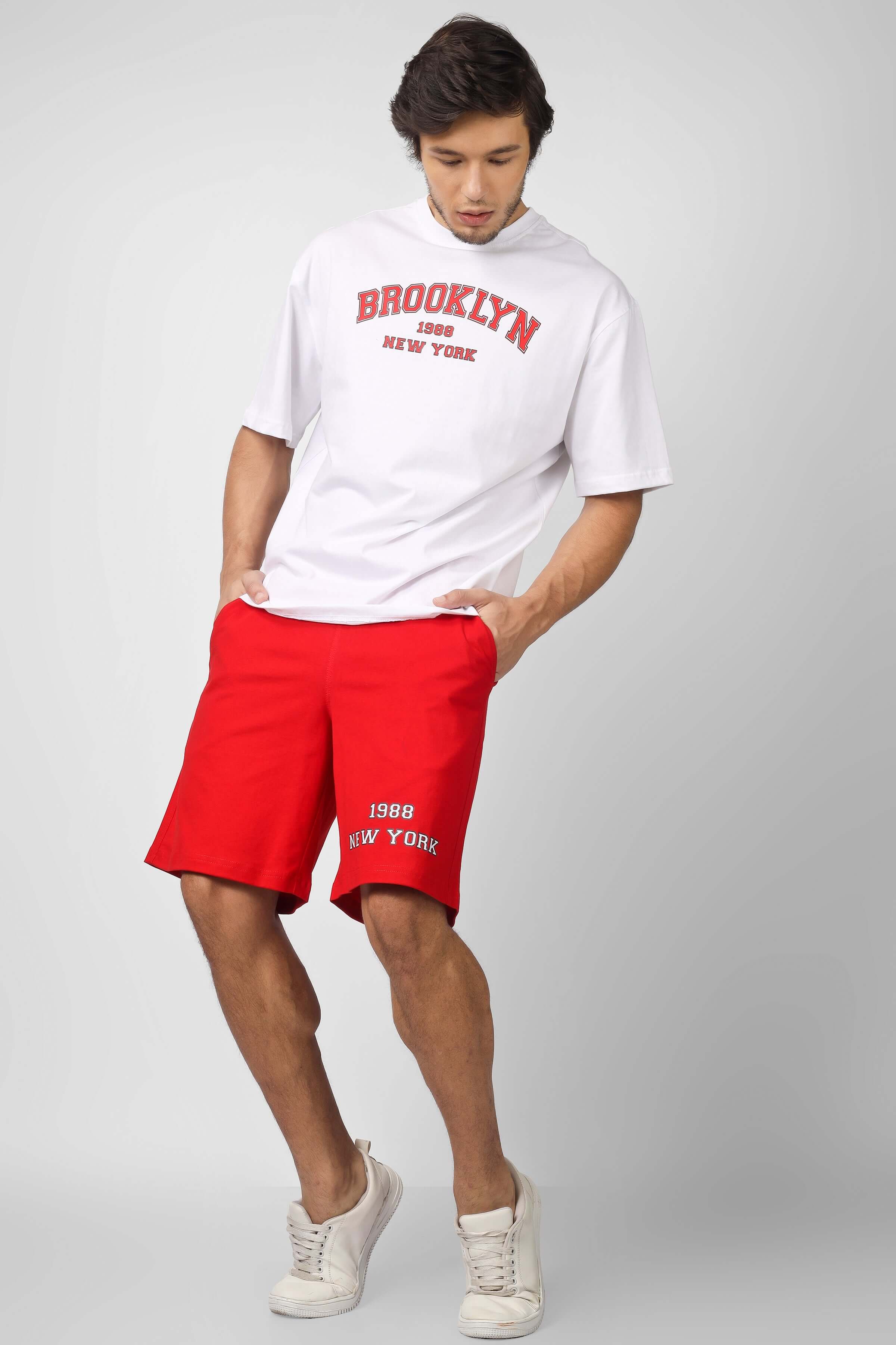 Model wearing the Brooklyn Co-Ord Set in white and red, showcasing a stylish and casual outfit with 'Custom Fit' option available.