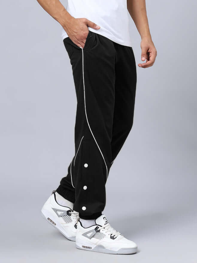 Black BROSSFINE Contrast Joggers worn with white sneakers, side view highlighting stylish design details