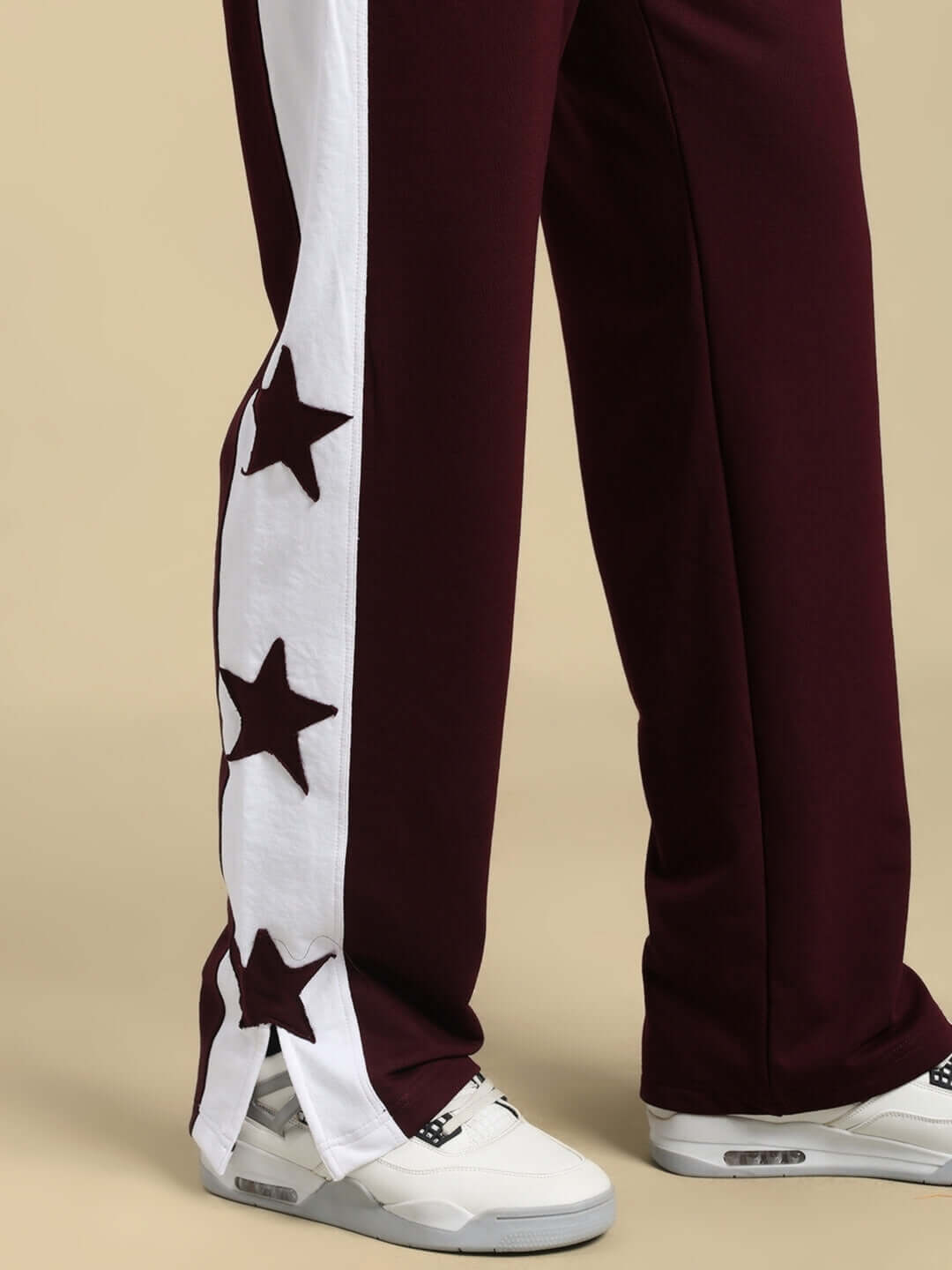 Brox Star Relaxed Fit Joggers in Maroon-White with star design and custom fit option. Stylish and comfortable fashion for all-day wear.