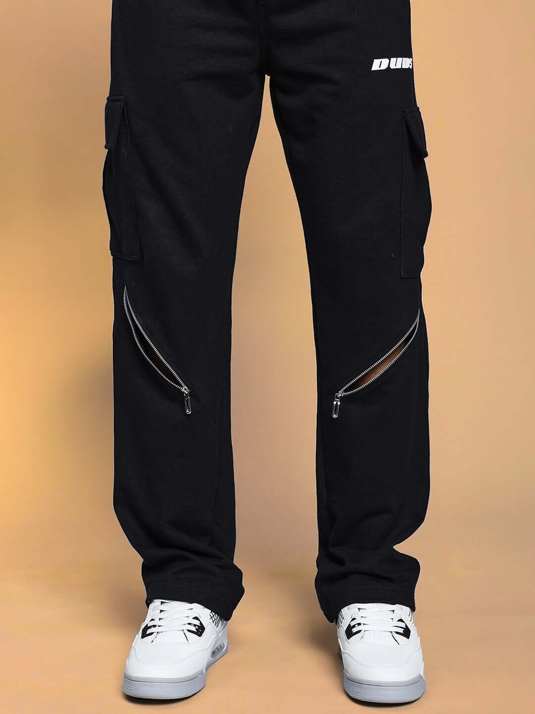 BRUNO black cargo pants with five pockets, zippered accents, and DUDS logo, made-to-order with custom fit options available.