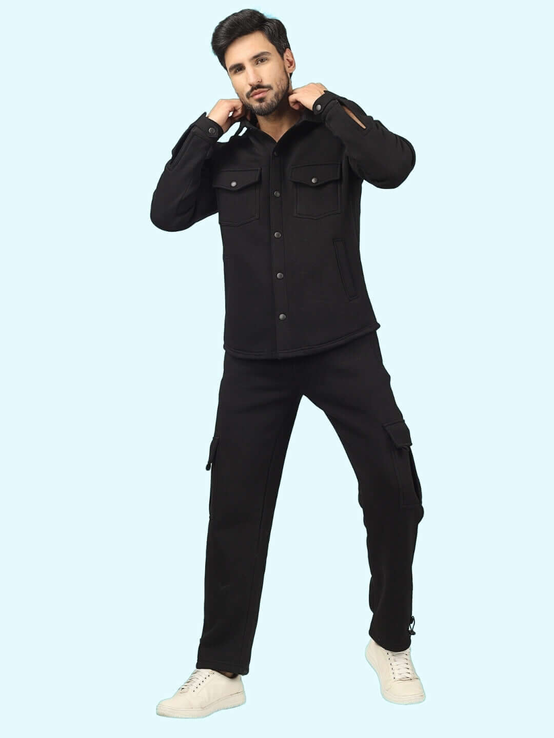 Man wearing Burly Black Overshirt and Cargo Pant Co-ord Set, showcasing stylish black outfit with pockets, perfect for casual wear.