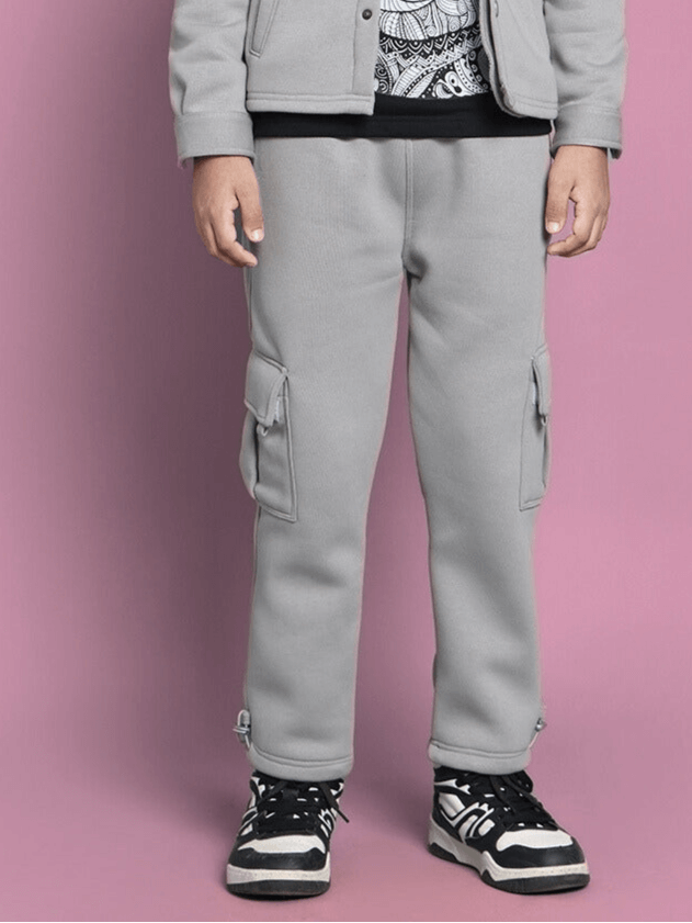 Grey Burly fleece pants for boys and girls, featuring comfortable fit and side pockets, perfect for casual wear.
