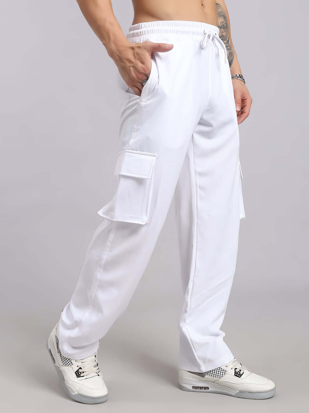 Carmine relaxed fit jogger in white with cargo pockets, customizable for perfect fit, ideal for comfortable, tailored style.