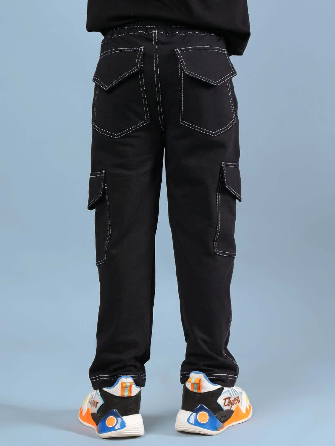 Black carpenter jogger pants for boys and girls with cargo pockets, custom fit option available, made by DUDS tailors.
