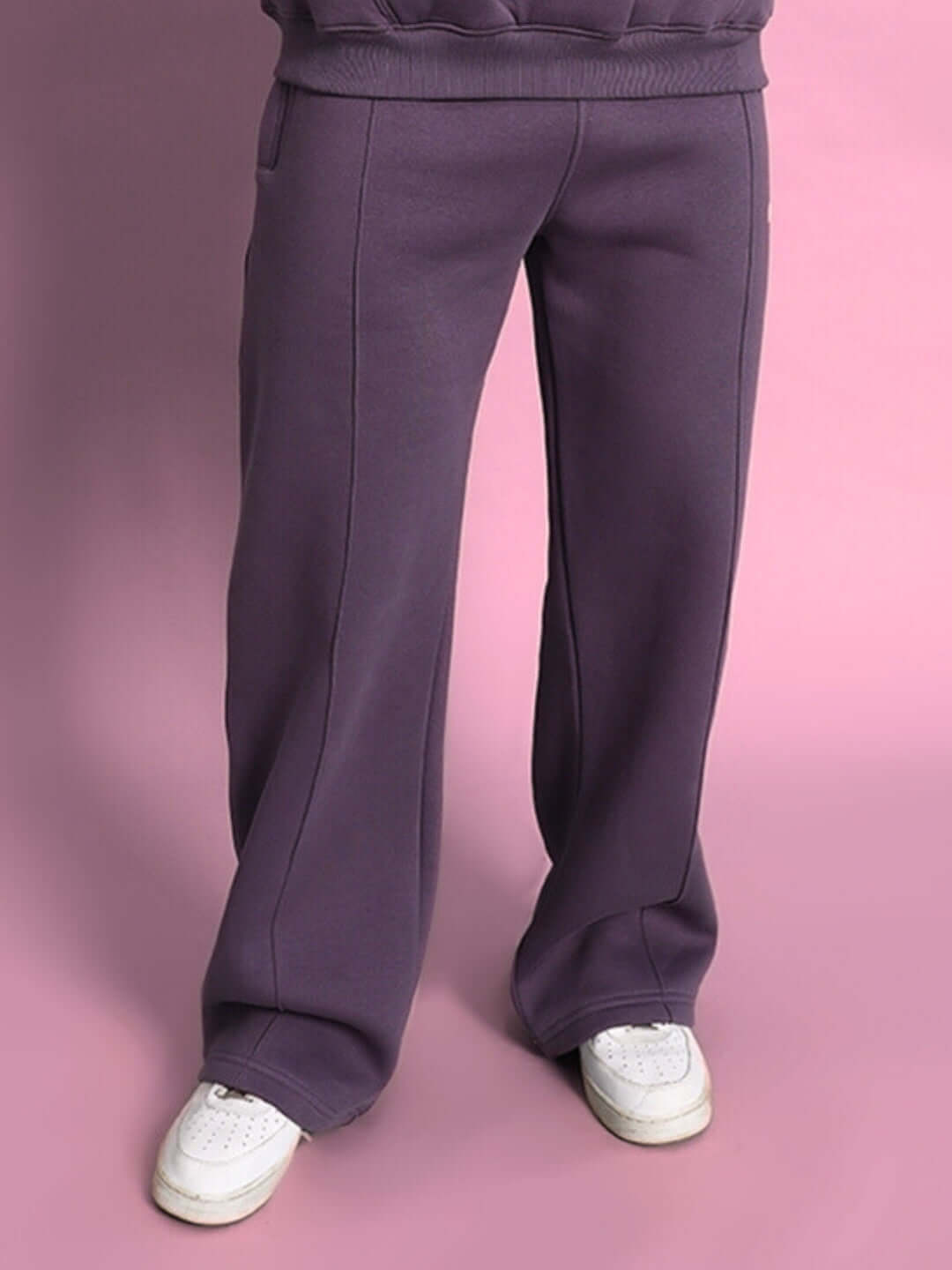 Violet Casper cotton fleece jogger pants for women, made to order, displayed against a pink background, available for custom fit options.