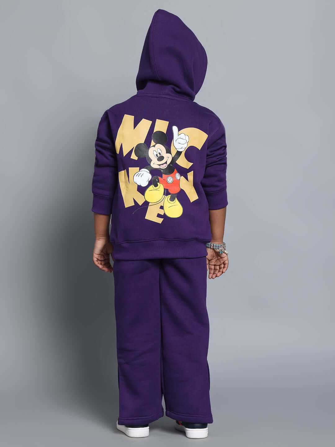 Child wearing purple CASPER FLEECE PANT FOR BOYS GIRLS with cartoon print on hoodie