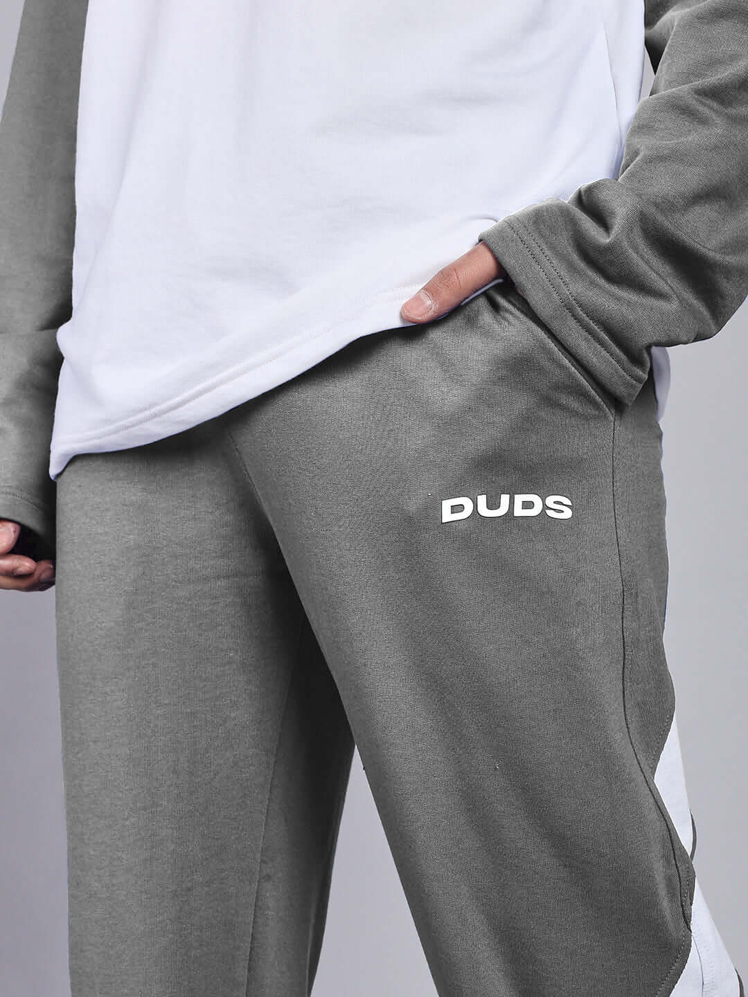 Person wearing CELESTINE Cool Relaxed Fit Jogger in grey and white by DUDS, showcasing comfortable and stylish design.