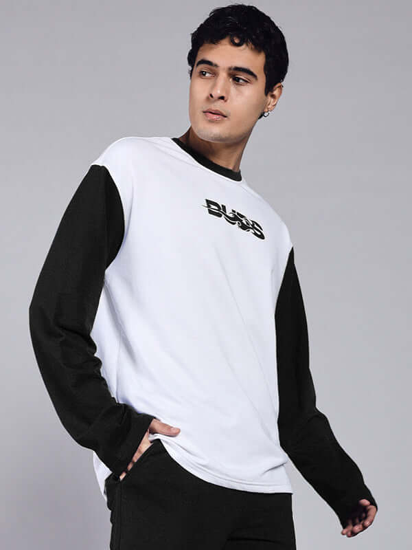 Model wearing Celestine Cool Sweatshirt in white and black, premium cotton fabric, stylish streetwear fashion.