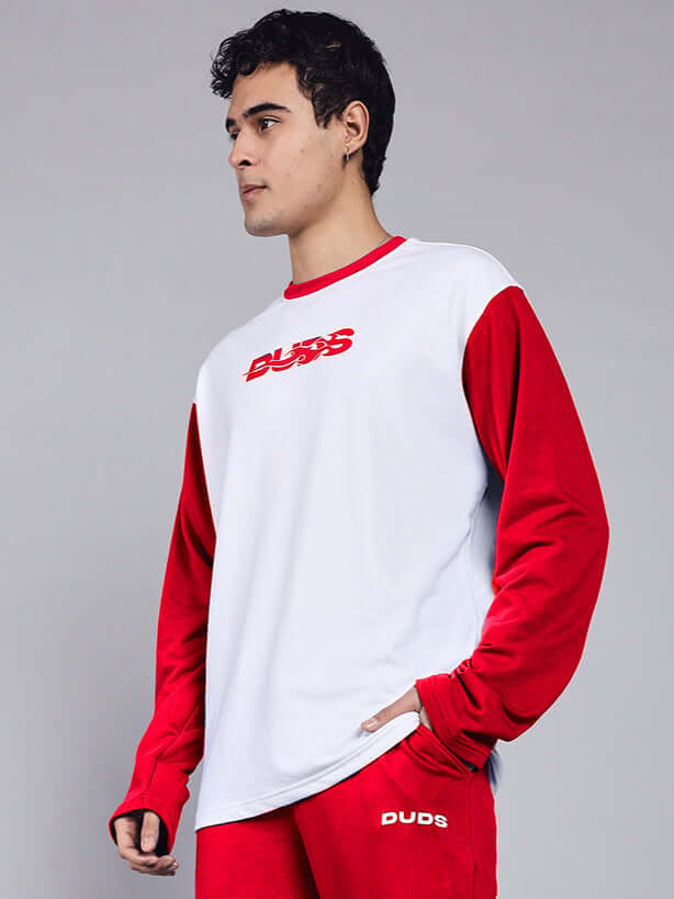 Model wearing Celestine Cool Sweatshirt in white and red, made from premium fabric with cotton terry, showcasing front view.
