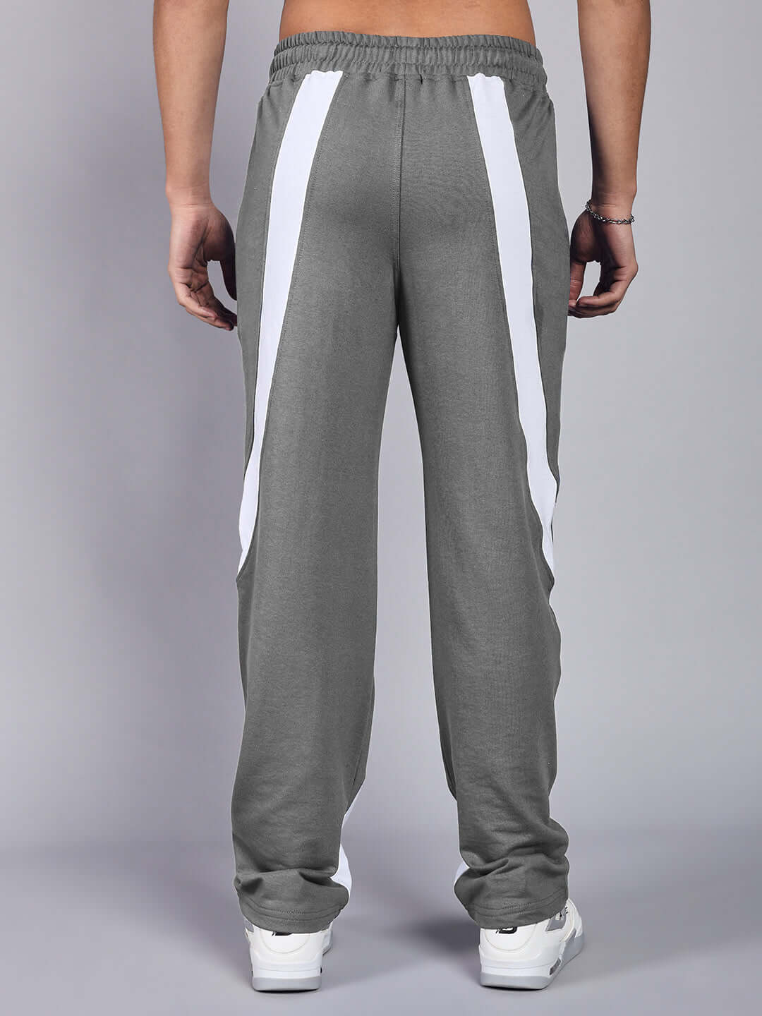 Back view of CELESTINE COOL RELAXED FIT CO-ORD SET WHITE GREY pants showing grey fabric and white detail design.