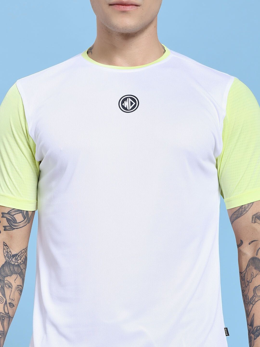 CHAMPION ZONE REGULAR FIT CO-ORD SET WHITE NEON BLACK men's top with logo, featuring neon sleeves on a blue background.