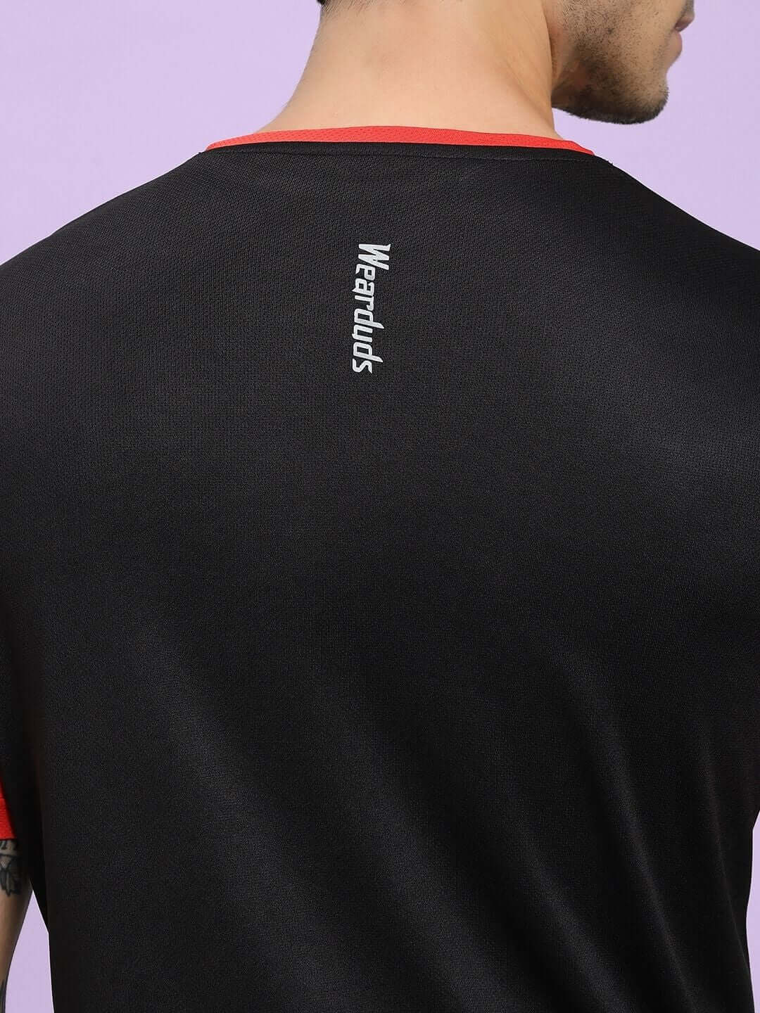 Back view of CHAMPION ZONE REGULAR FIT T-SHIRT BLACK RED highlighting design and color contrast.