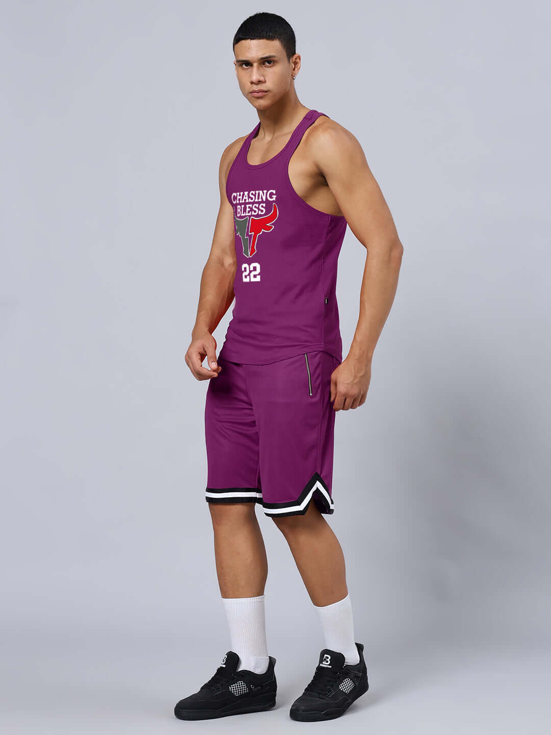 Man wearing CHASING BLESS PRINTED GYM CO-ORD SET PURPLE, featuring premium cotton t-shirt and sports polyester bottoms.