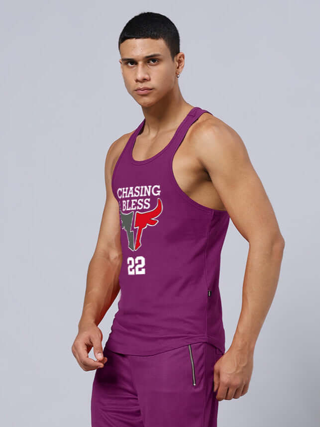 Model wearing Chasing Bless printed purple gym t-shirt, customizable for custom fit, perfect for workout and casual wear.