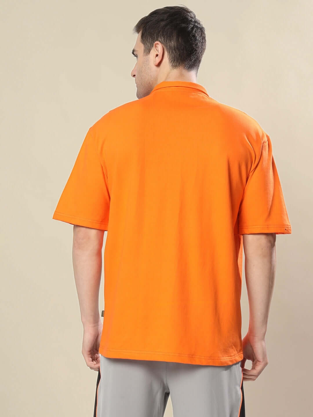 Back view of CHEUGY OVERSIZED POLO T-SHIRT ORANGE WHITE in premium cotton material