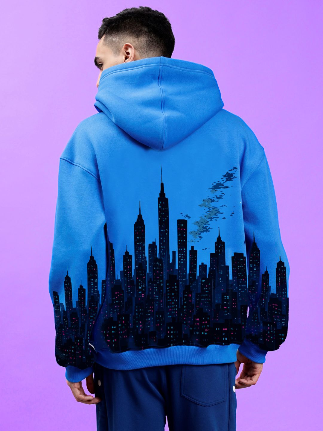 CITY OF DREAMS PRINTED HOODIE ROYAL BLUE featuring a cityscape design, perfect for stylish dream-chasers seeking bold fashion and comfort.