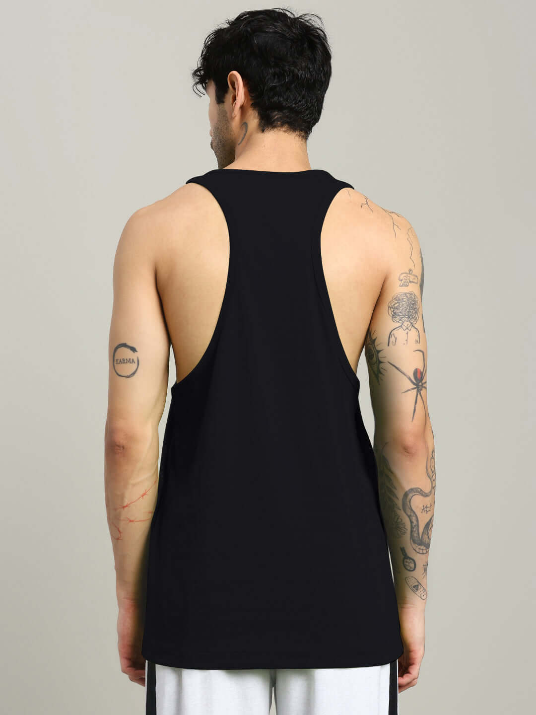 Back view of a person wearing a black Classical Greek gym T-shirt with custom fit options available.