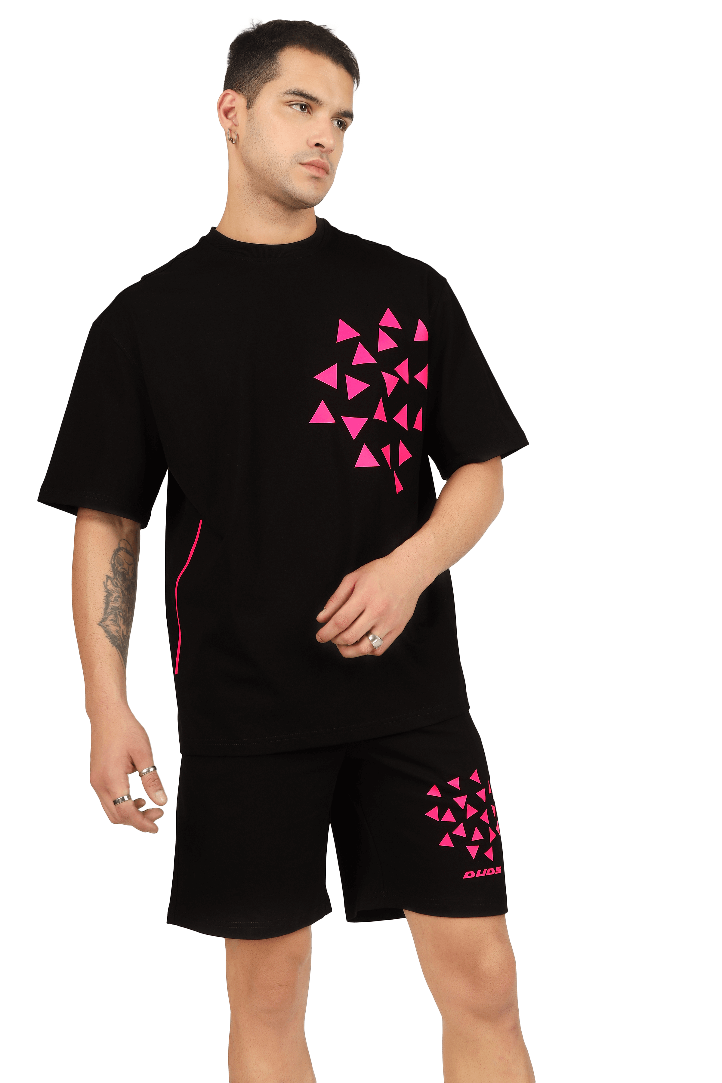 Model wearing black CO-ORD set with star dust print, featuring customized fit option available from DUDS, ideal casual fashion choice.