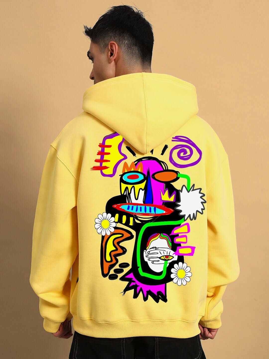 CONFUSED FLEECE OVERSIZED HOODIE YELLOW with vibrant abstract print, showcasing bold streetwear style and cozy comfort.