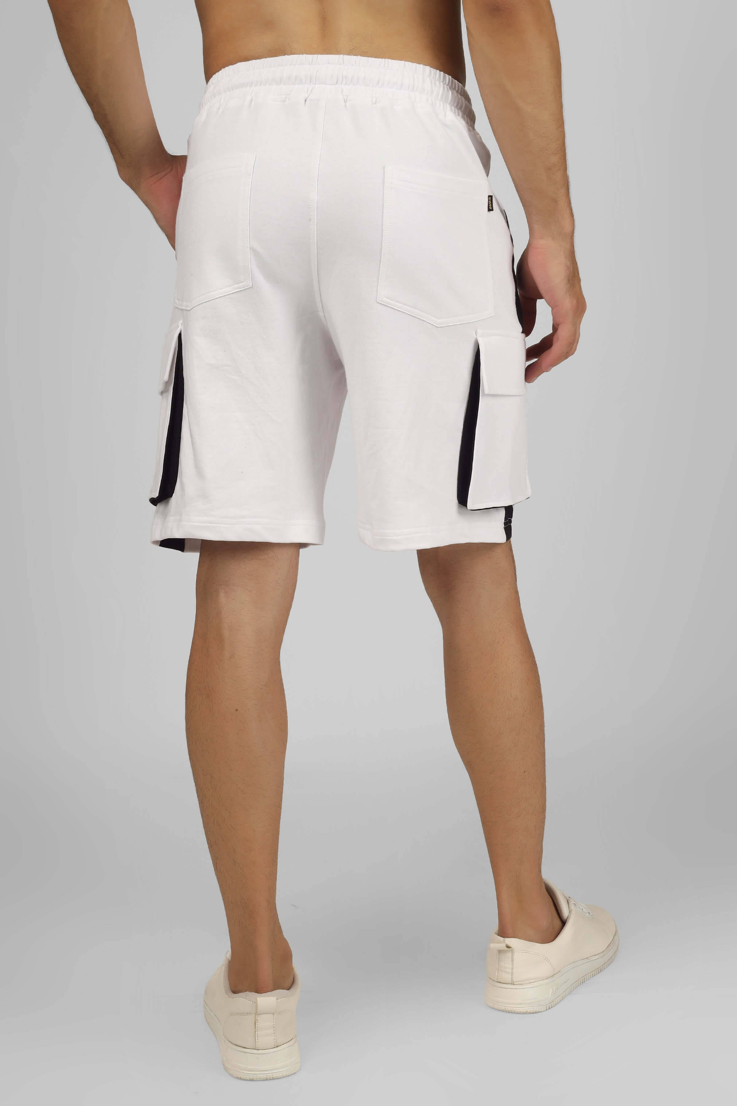 Back view of white and black Contra Regular Fit Cargo Shorts, showcasing pocket design and fit. Ideal for casual, customizable fashion.