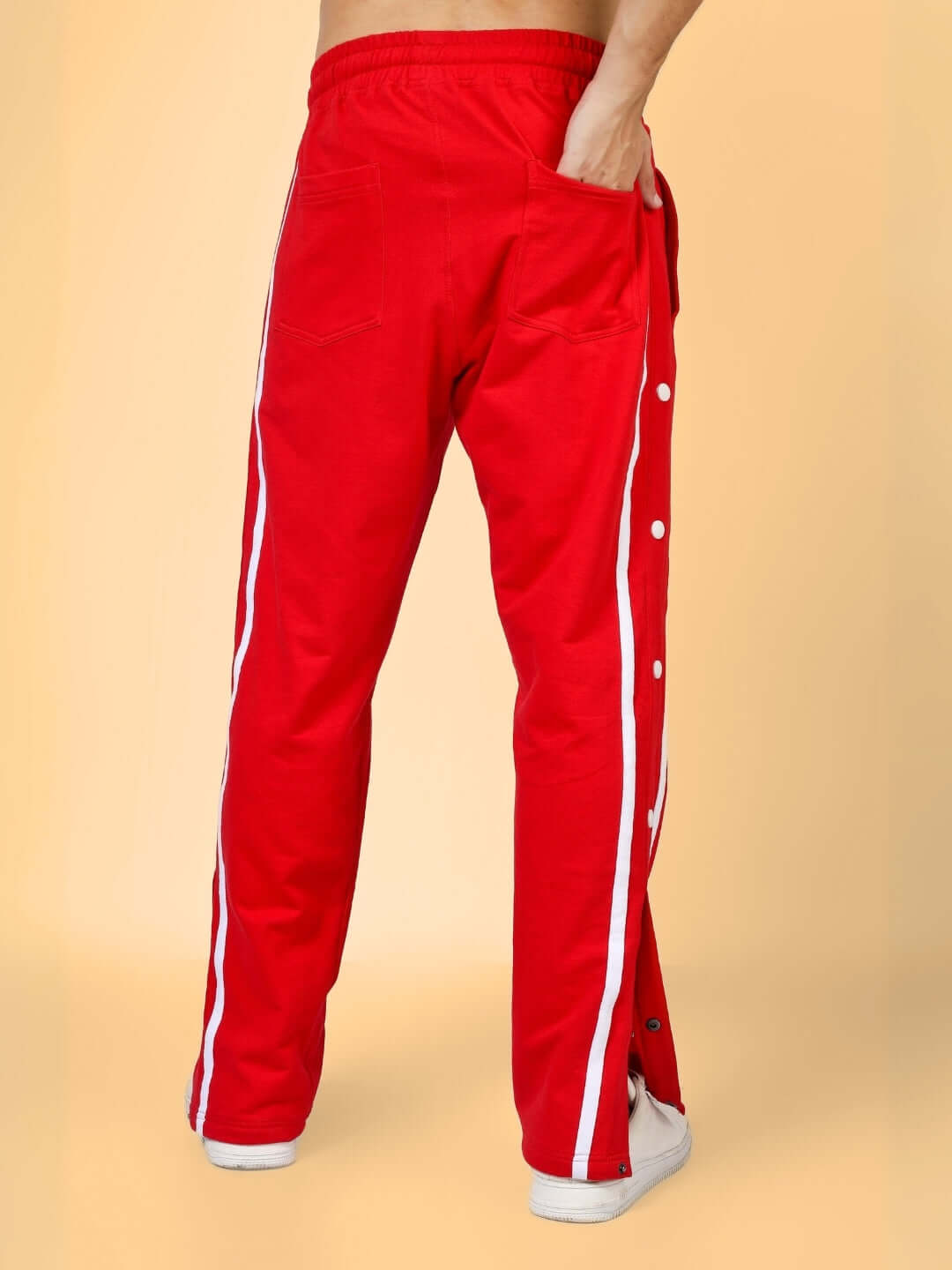 Red contrast panel joggers with white side stripes, personalized fit options available. Made to order by DUDS.