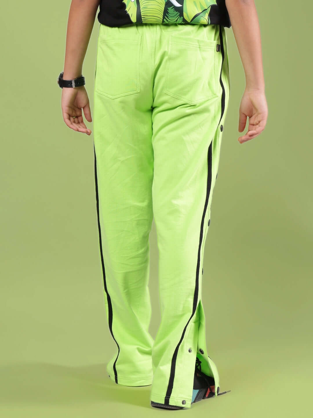 Back view of CONTRAST PANEL JOGGER FOR BOYS & GIRLS NEON GREEN with black stripes, customizable size option available.