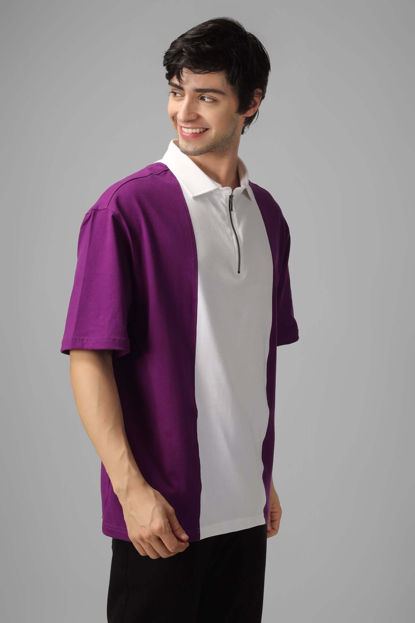 Model wearing CONTRAST POLO OVERSIZED ZIPPER T-SHIRT in purple-white with half sleeves and metal zipper, showcasing premium cotton fabric.