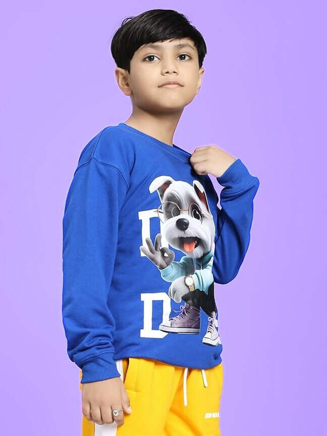 Child wearing COOL PUP SWEATSHIRT FOR BOYS AND GIRLS ROYAL BLUE, featuring a cute dog design, perfect for fashionable and active kids.