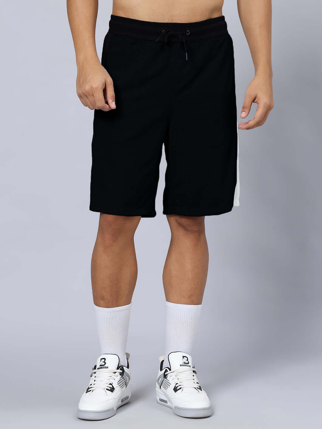CRUNCH REGULAR FIT SHORTS BLACK worn by model, featuring customizable fit option for perfect sizing.