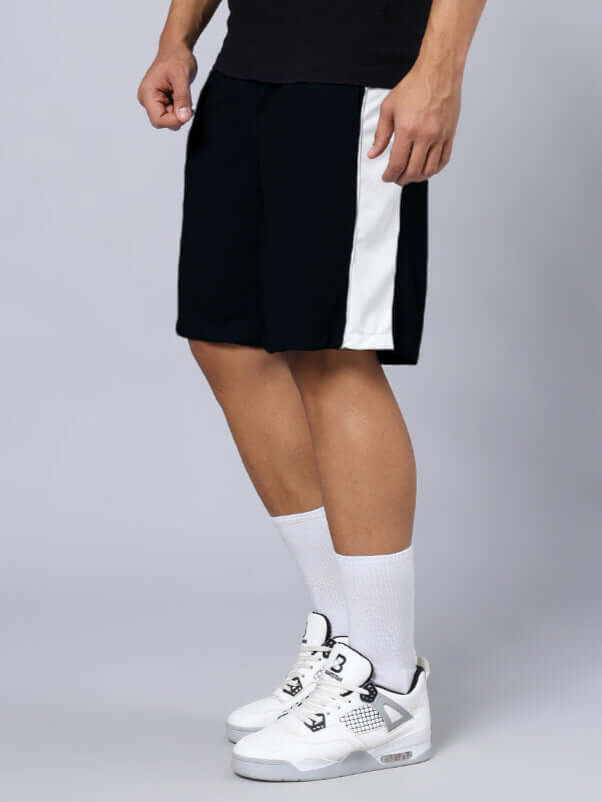 CRUNCH REGULAR FIT SHORTS BLACK on model showcasing side stripe design