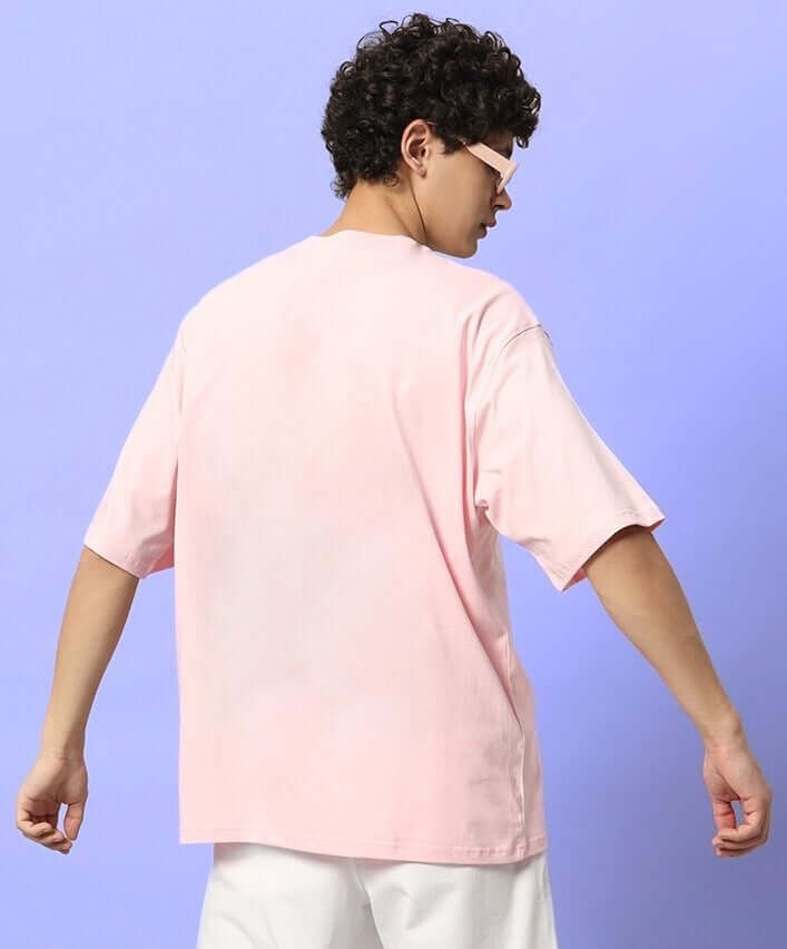 Man wearing CUTE BEAR OVERSIZED T-SHIRT PINK viewed from the back