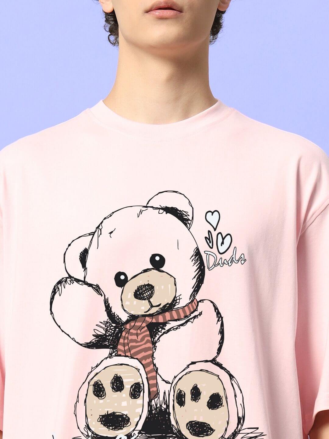 CUTE BEAR OVERSIZED T-SHIRT PINK with adorable bear graphic on front, showcasing playful street style fashion in ultra-soft cotton.