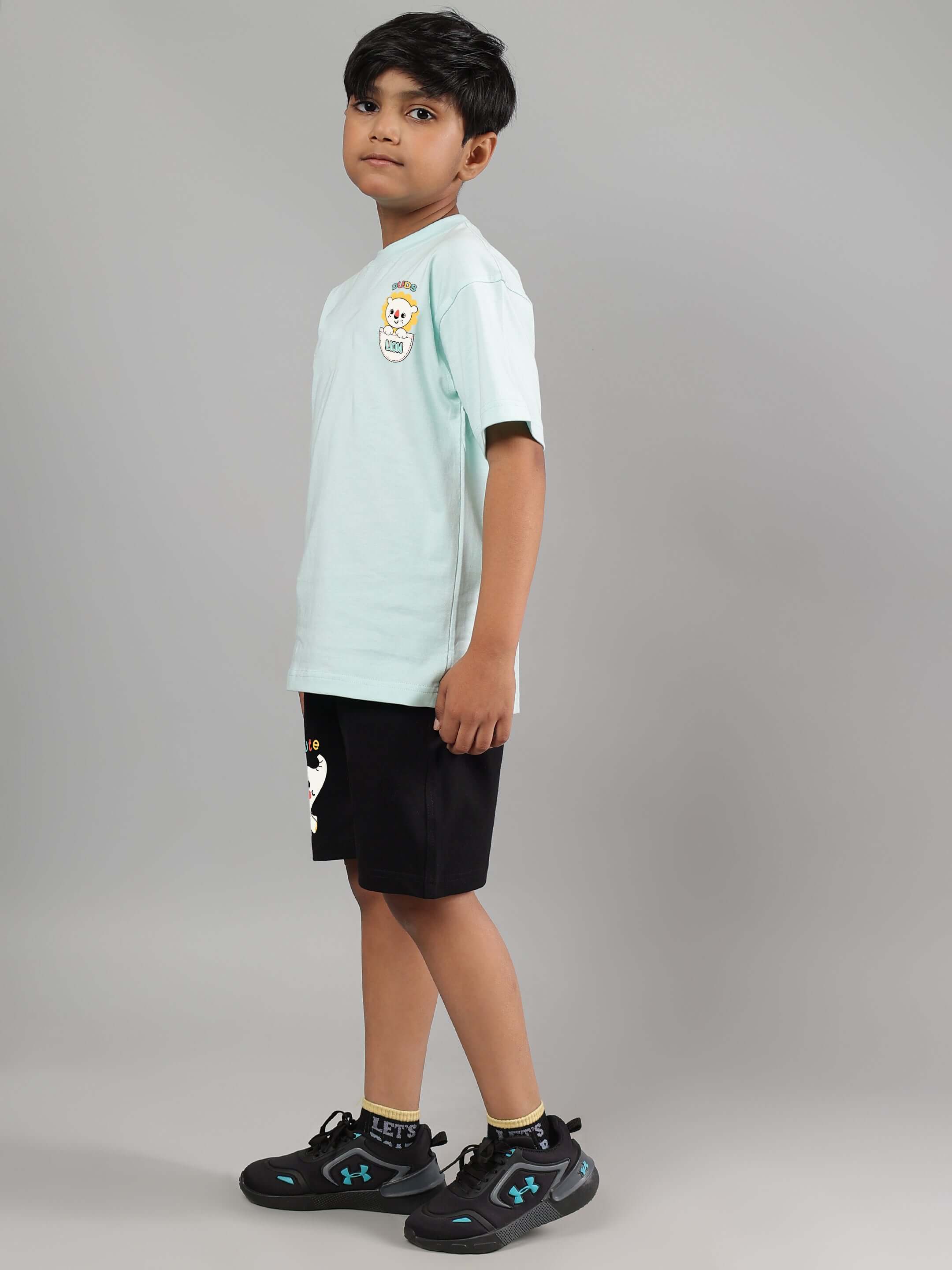 Boy wearing cute elephant co-ord in sky blue and black; ideal unisex outfit for kids made to order by DUDS tailors.