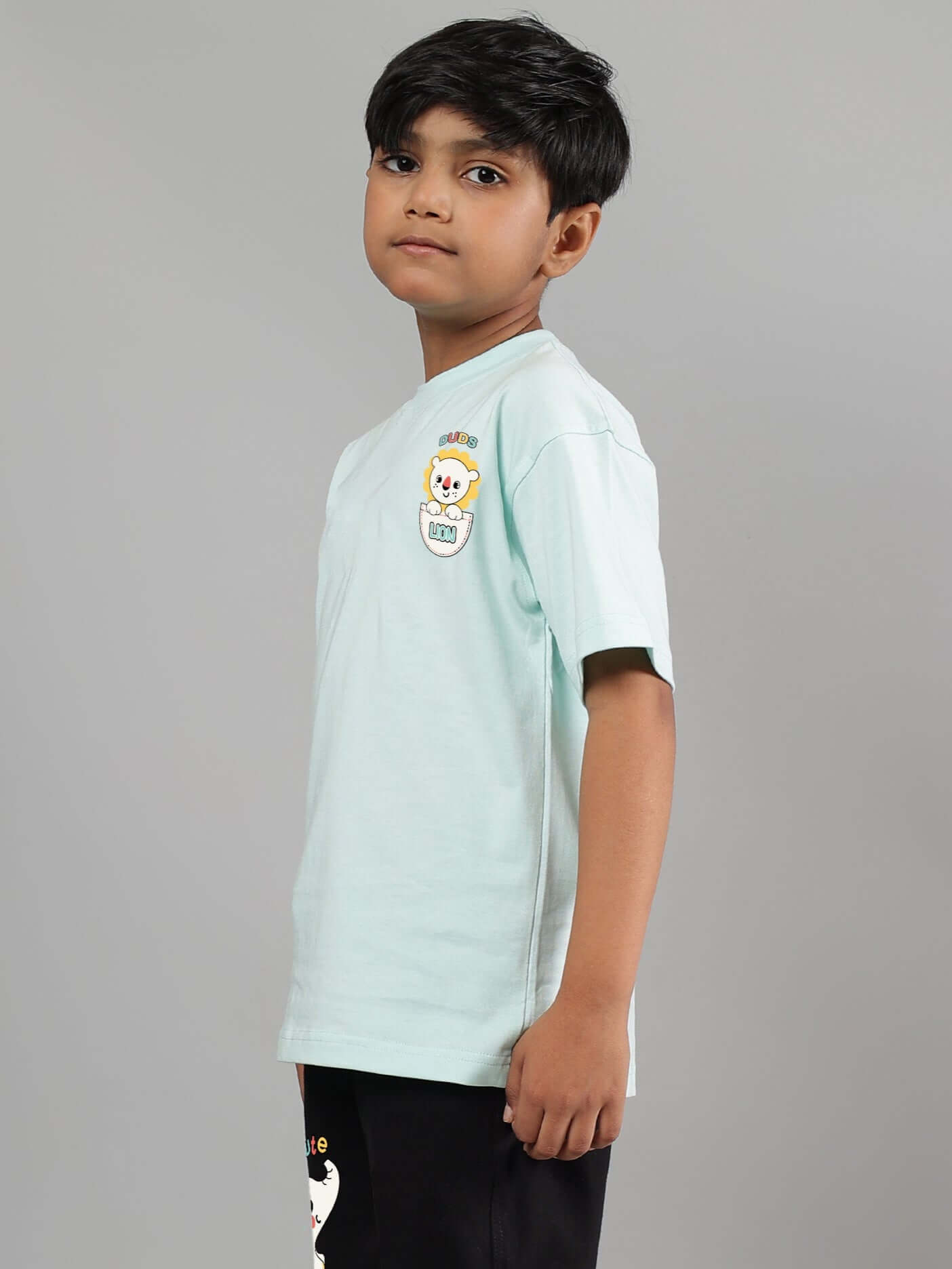 Sky blue elephant t-shirt for boys & girls, side view, worn by child. Perfect for custom fit orders, tailored by DUDS.