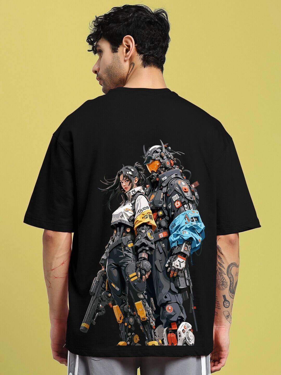 Person wearing CYBERPUNK OVER-SIZED T-SHIRT BLACK with futuristic graphic on the back, embodying edgy cyberpunk street style.