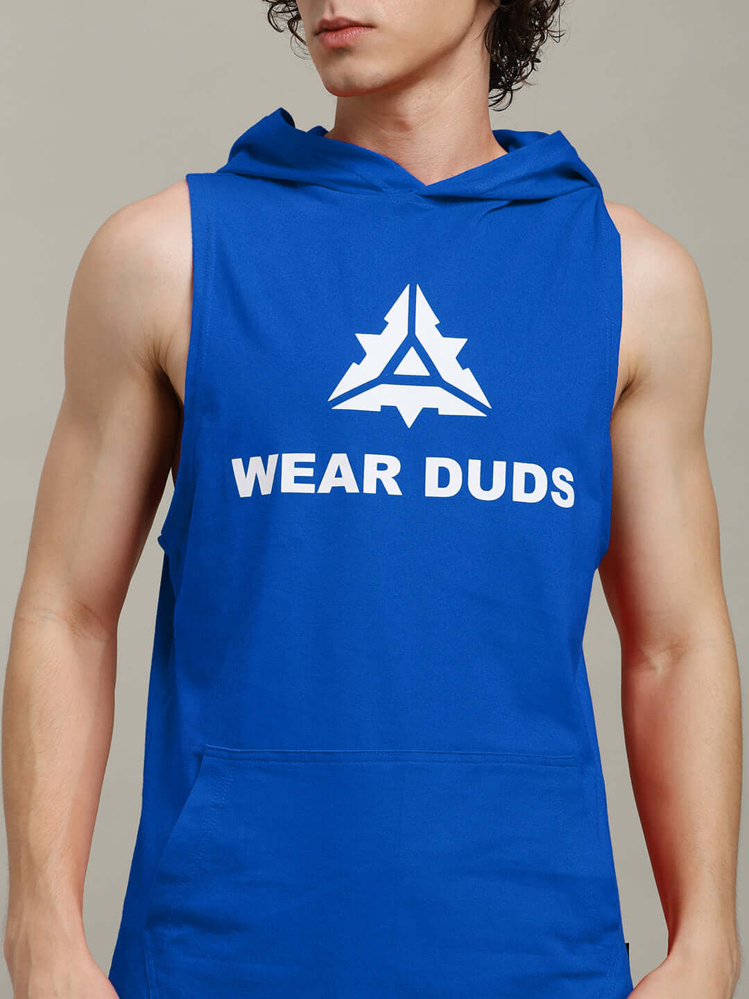 CYBRAN GYM HOODED T-SHIRT BLUE worn by model, showcasing sleeveless design and vibrant color