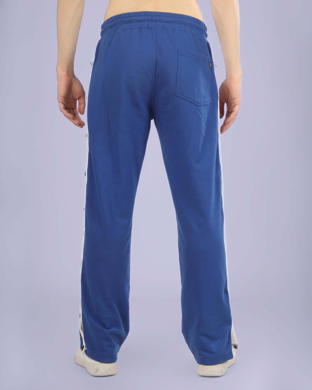 Back view of royal blue joggers showcasing comfortable fit and pocket detail, designed by DUDS for custom and standard sizing.