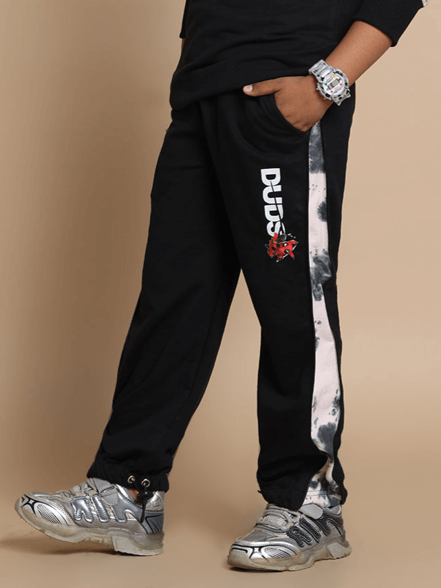 Black Deadpool jogger pants for boys and girls featuring DUDS logo, customizable fit, made to order with expert craftsmanship.