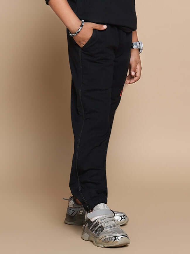 Black Deadpool joggers for boys and girls, comfortable casual wear with customizable sizing option. Made to order by DUDS.