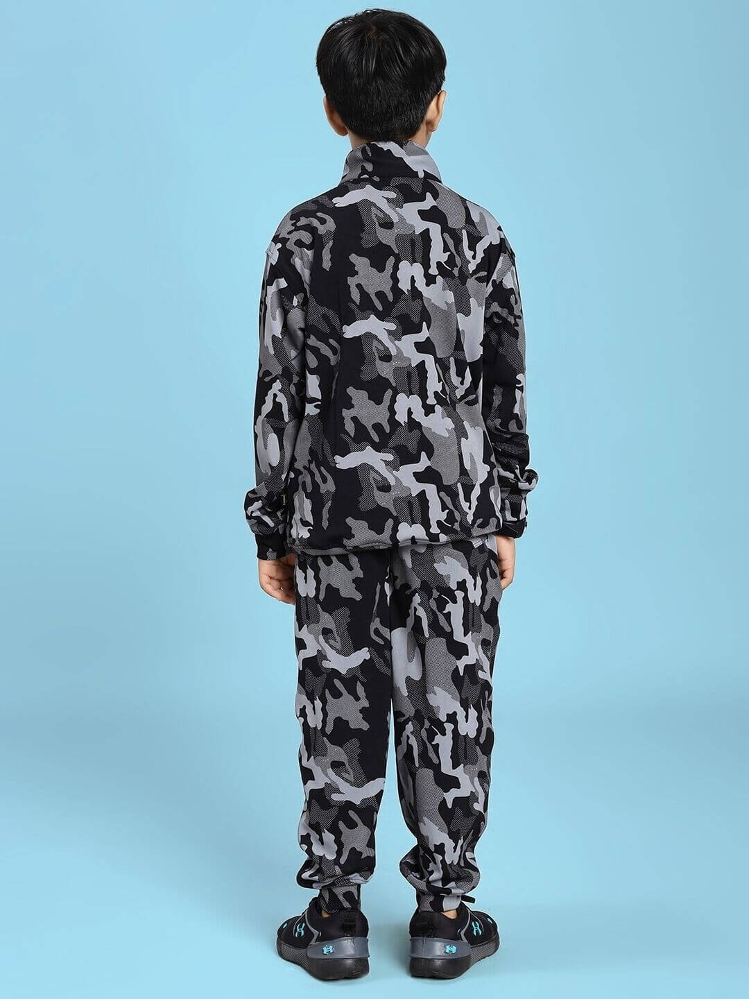 DEFENCE CO-ORD SET FOR BOYS AND GIRLS BLACK GREY, camo print viewed from the back on a light blue background
