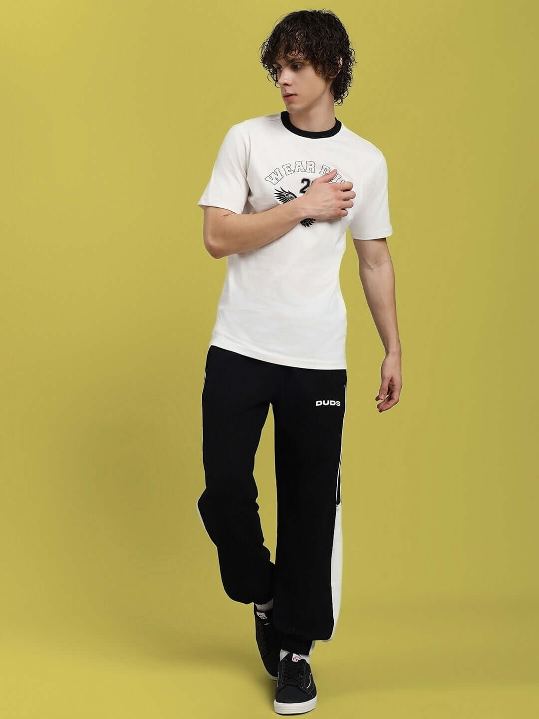 Model wearing DENVER RELAXED FIT JOGGERS BLACK showcasing comfortable and versatile fashion.