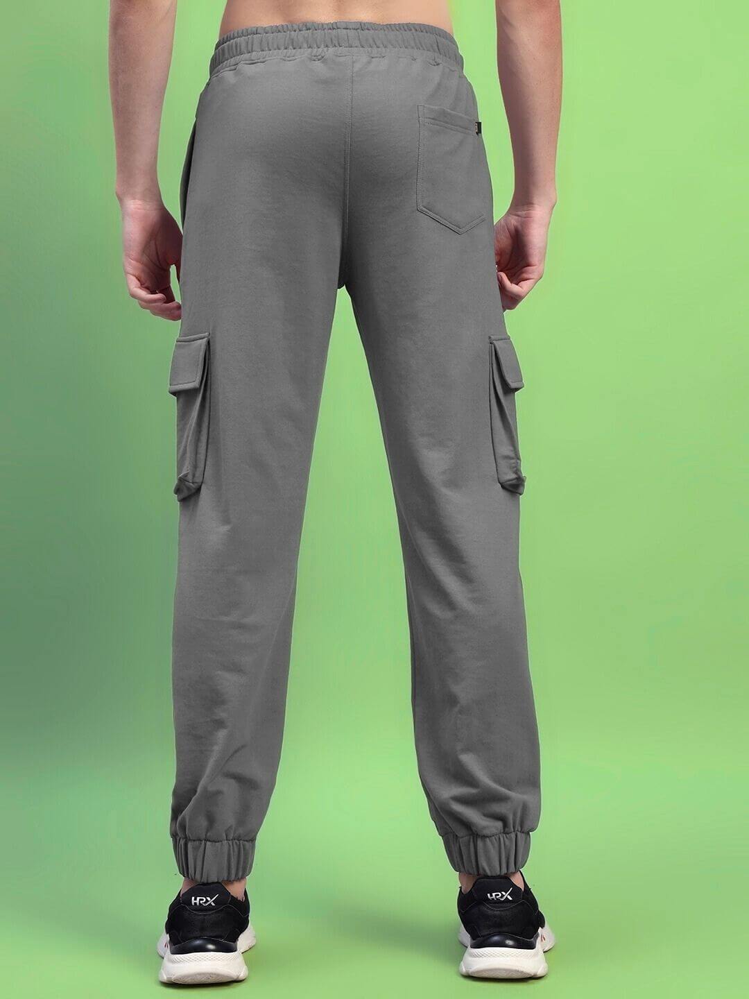 Back view of DEVENO RELAXED-FIT JOGGERS GREY with pockets and elasticated cuffs for style and comfort.