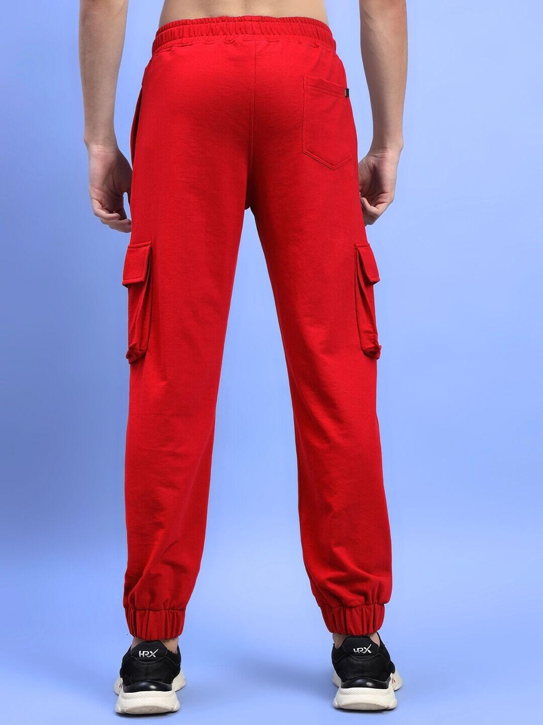 Back view of DEVENO RELAXED-FIT JOGGERS RED with pockets, showcasing elastic waistband and comfortable fit.