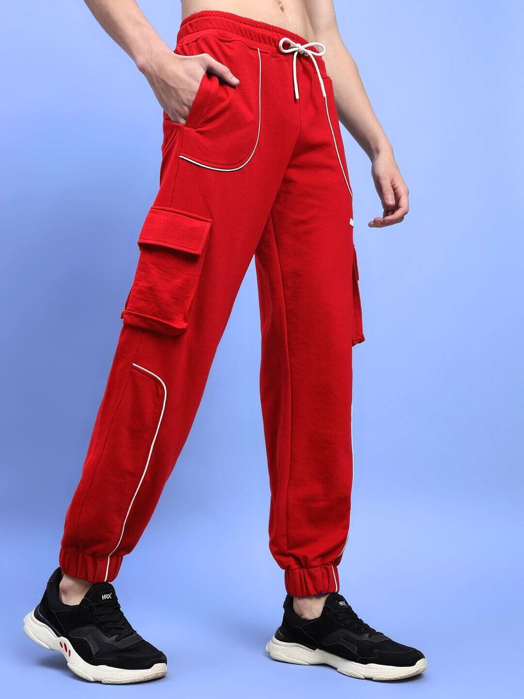 DEVENO RELAXED-FIT JOGGERS RED with elasticated waistband and side pockets, perfect for style and comfort.