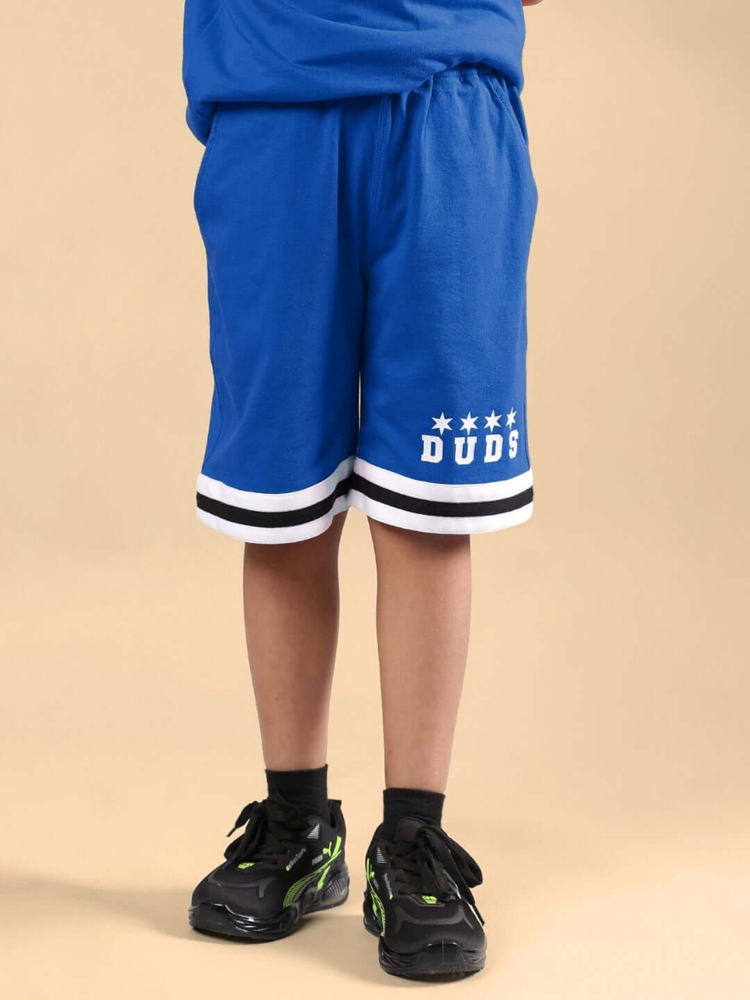 DIGGIN CO-ORD FOR BOYS & GIRLS BLUE shorts by DUDS, made-to-order with customizable fit. Shipping 7-10 days. Perfect for boys and girls.