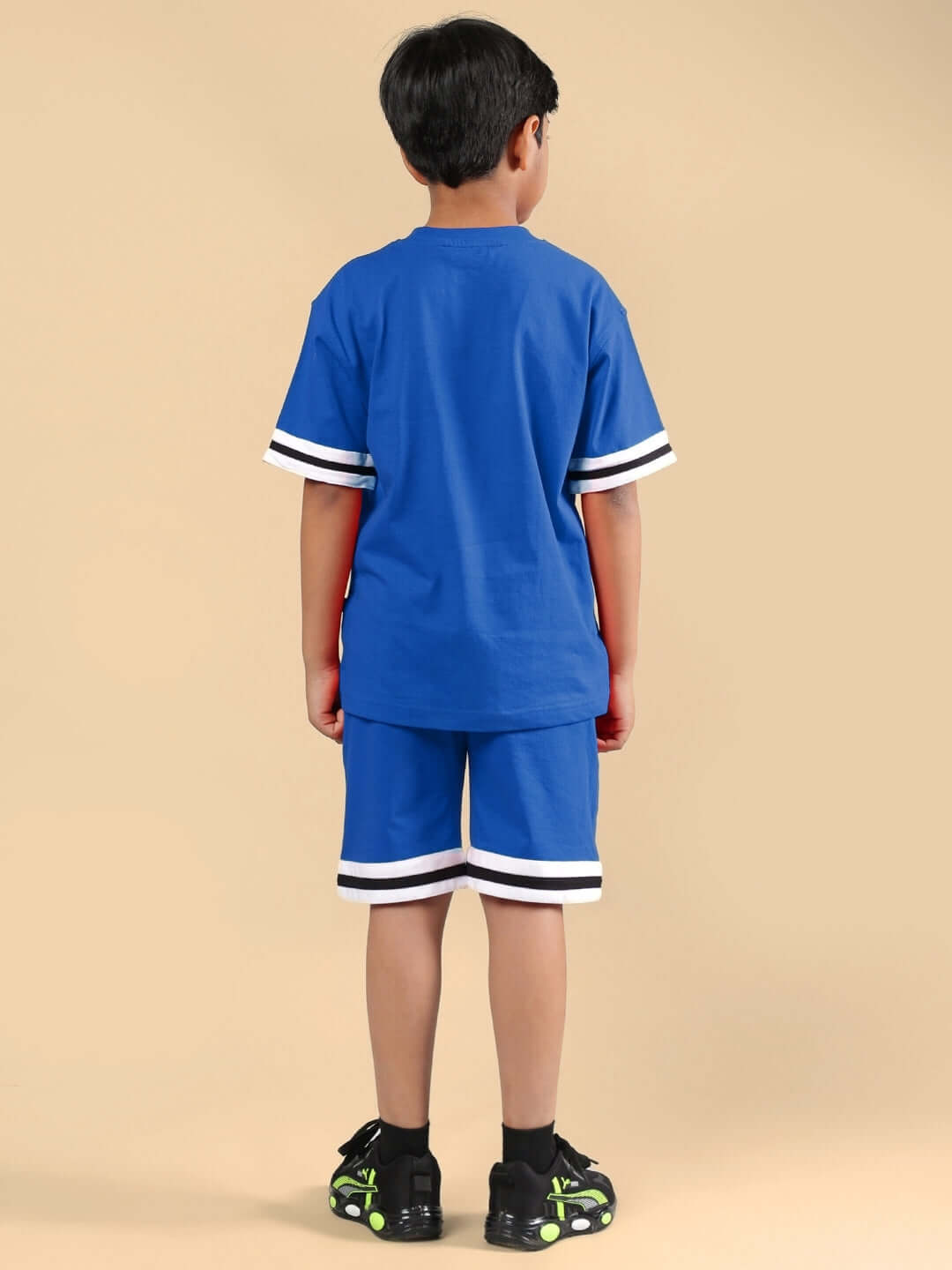 DIGGIN CO-ORD FOR BOYS & GIRLS BLUE outfit with striped sleeves and shorts, rear view of child wearing the set, made to order.