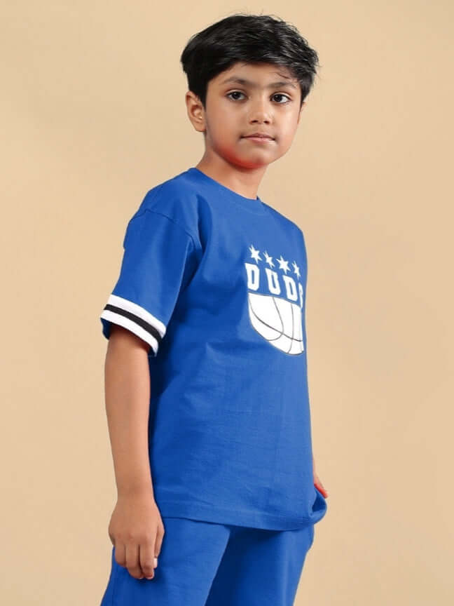 Child wearing DIGGIN OVERSIZED T-SHIRT FOR BOYS & GIRLS BLUE with a sporty design, showcasing casual fashion.