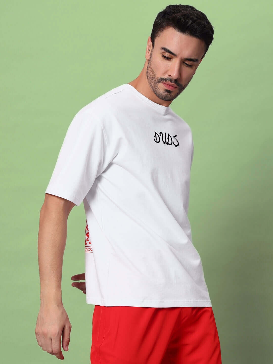 Model wearing DIMENSION oversized white t-shirt, premium heavy gauge fabric, comfortable casual wear for modern style.