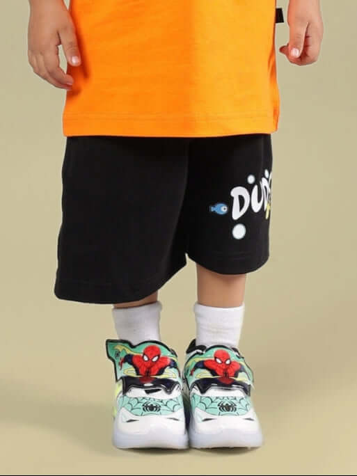 DIVING BEAR SHORTS FOR BOYS & GIRLS BLACK with cartoon design, worn by child, customizable size option, made to order by DUDS.